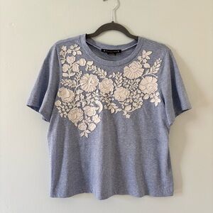 Women’s Pankaj & Nidhi Stylish Blue Tee with White Floral Accents - size medium